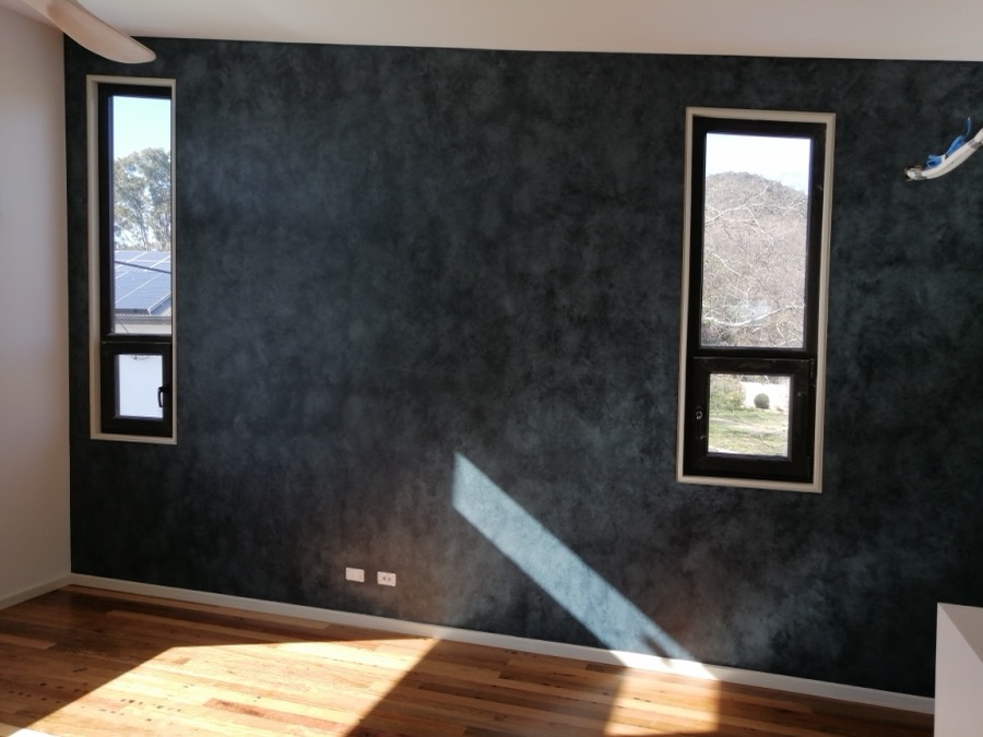 Finished deep blue Porter's Paints suede-effect feature wall in a Canberra living room